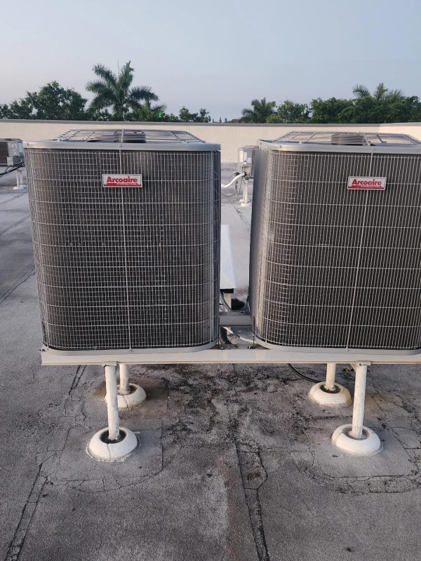 a group of air conditioning units on a roof