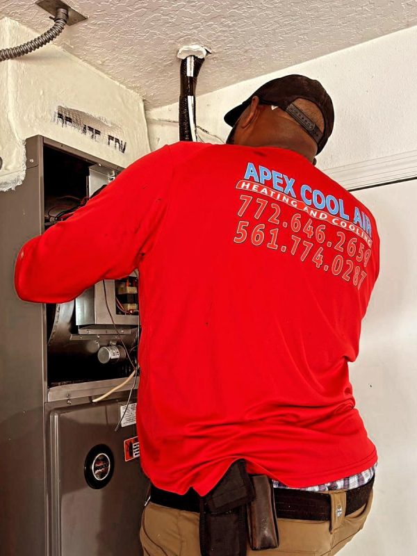Apex Cool Air technician performing AC repair in Port Saint Lucie, FL, showcasing expert local AC repair services for residents seeking reliable AC repair near me.